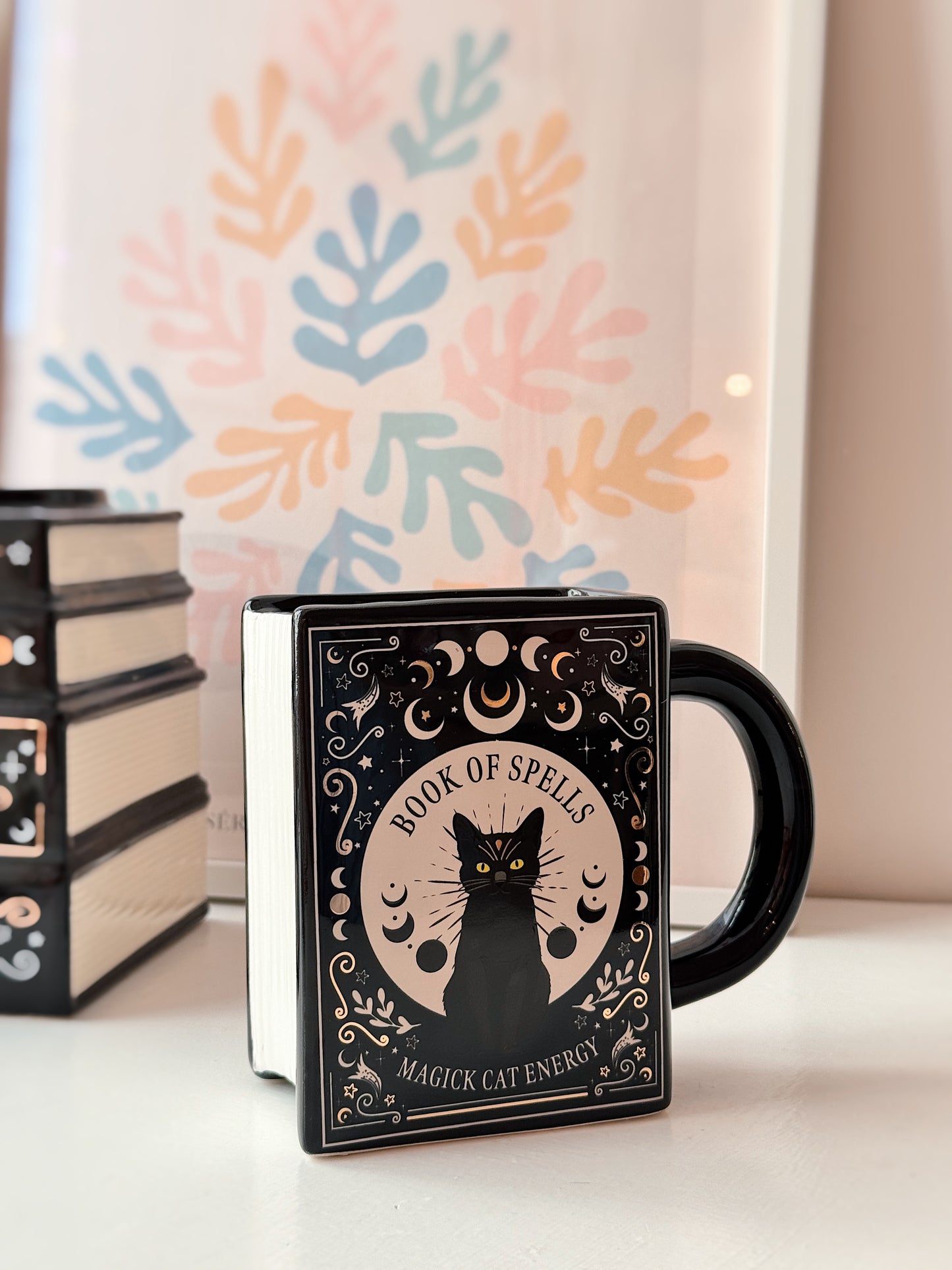 Tazza libro degli incantesimi gatto nero