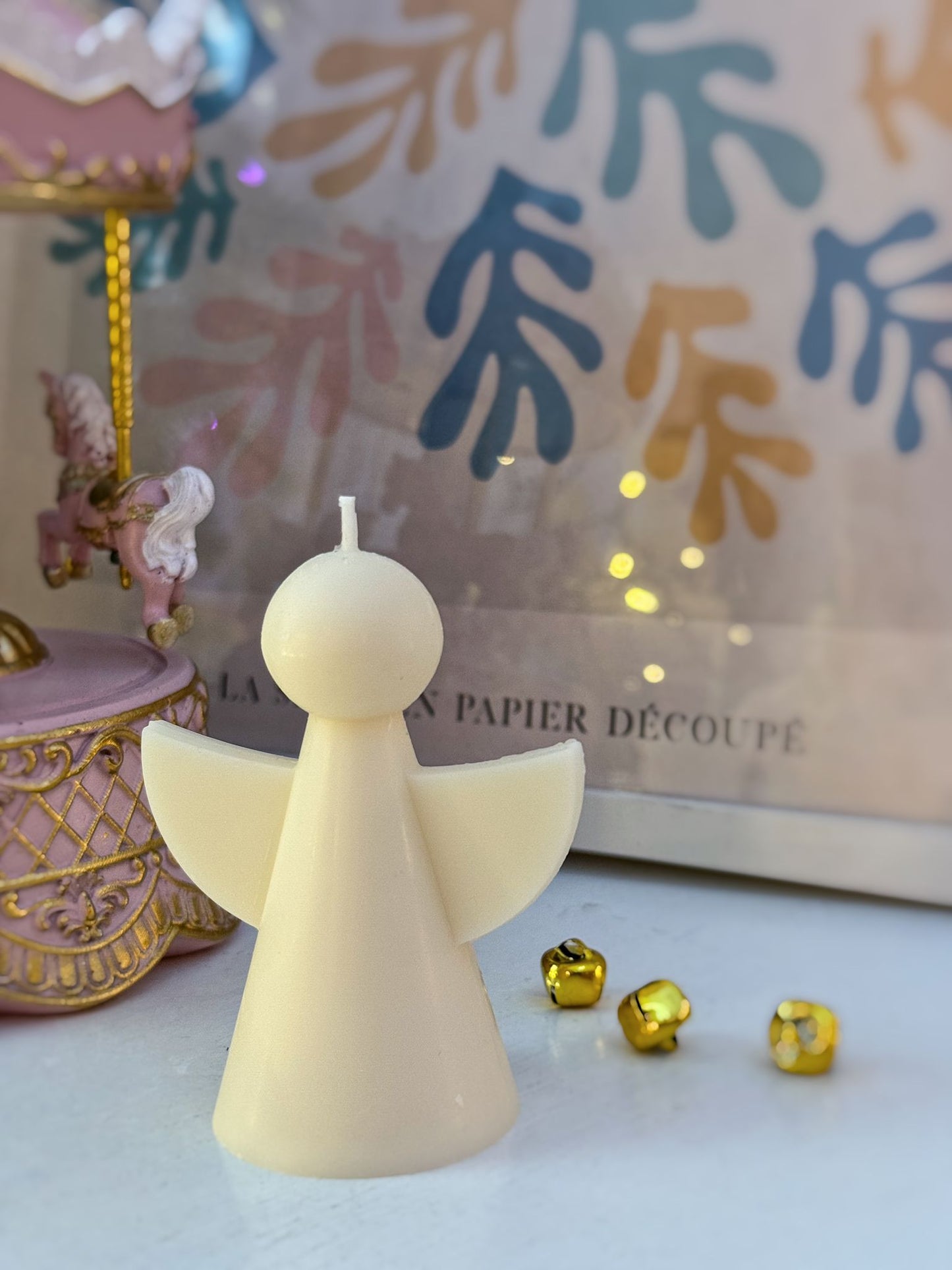 Candela angioletto stilizzato