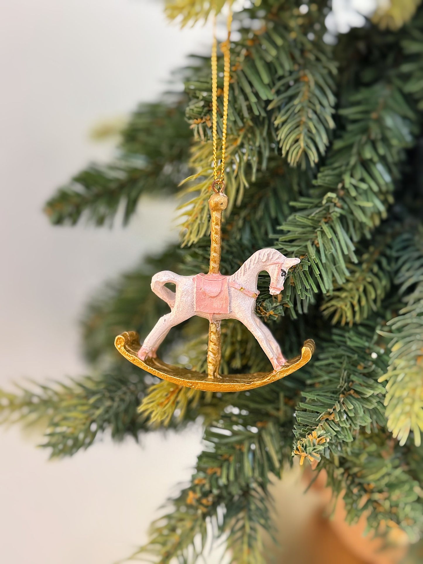 Pallina cavallo a dondolo rosa e oro