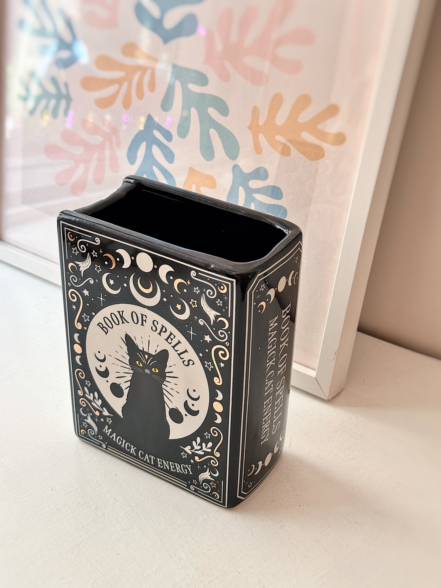 Vaso libro degli incantesimi gatto nero