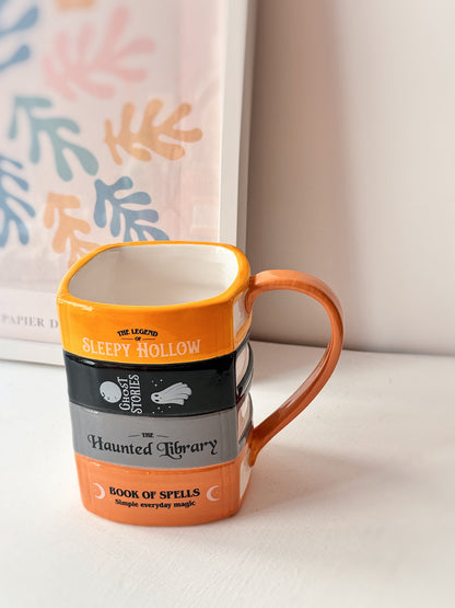 Tazza libri della biblioteca infestata