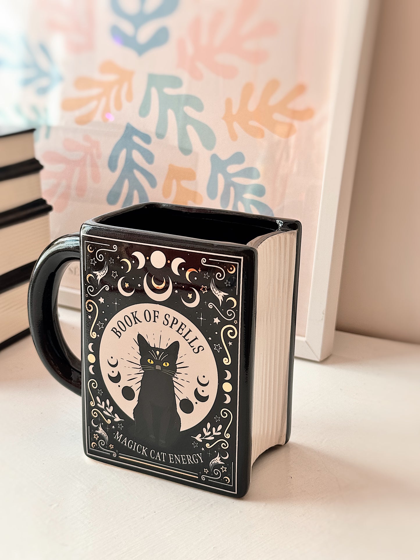 Tazza libro degli incantesimi gatto nero