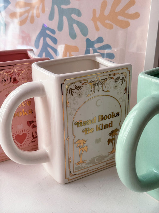 Tazza bianca a forma di libro “Read books. Be kind”